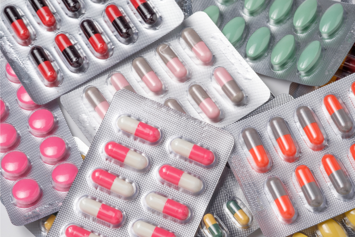 Pharmacist consulting patient